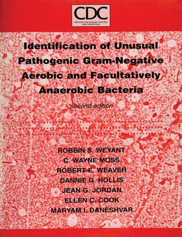 This image depicts the cover of the second edition of the medical reference textbook 'Identification of Unusual Pathogenic Gram-Negative Aerobic and Facultatively Anaerobic Bacteria,' commonly known in clinical microbiology as 'The Orange Book.' The cover features the Centers for Disease Control and Prevention (CDC) logo at the top. The background consists of a red-and-white stippled pattern that visually resembles a high-magnification view of bacterial colonies or microscopic features. The text identifies several key contributors, including Robbin S. Weyant, C. Wayne Moss, Robert E. Weaver, Dannie G. Hollis, Jean G. Jordan, Ellen C. Cook, and Maryam I. Daneshvar. This resource is a definitive laboratory reference for the characterization and identification of rare or difficult-to-culture human pathogenic bacteria, serving as a critical tool for medical microbiologists and infectious disease specialists in diagnostic and public health settings.