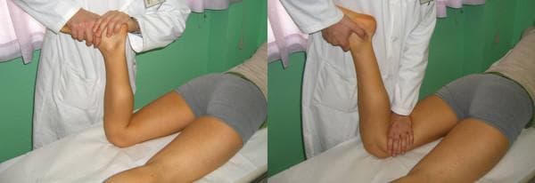 Two side-by-side clinical photographs demonstrating the Apley grinding test, a physical examination maneuver for knee pathology. The patient is positioned prone on an examination table with the affected knee flexed to 90 degrees. The examiner, wearing a white coat, is positioned at the foot of the table. The left image illustrates the distraction component of the test: the examiner grips the patient's ankle and applies an upward pulling force combined with internal or external rotation to assess for ligamentous or capsule injury. The right image illustrates the compression (grinding) component: the examiner applies a downward longitudinal force through the tibia while rotating the foot. This maneuver compresses the menisci between the femoral condyles and tibial plateau; pain during this phase suggests a meniscal lesion. The images serve as an educational guide for orthopedic clinical assessment, highlighting the importance of comparing response to distraction versus compression forces in differentiating meniscal tears from ligamentous or chondral pathology.
