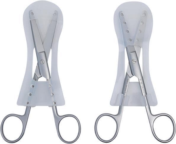 This clinical product image displays two views of a 'Scissor-Tip-Separator', a medical device designed for surgical instrument sterilization and protection. The device is constructed from translucent, flexible medical-grade silicone and features a distinctive inverted U-shaped silhouette with a widened base. The image demonstrates a pair of stainless steel surgical scissors inserted into the separator. In the front view (left), the scissor blades are held in an open, divergent position within a protective safeguard dome. In the back view (right), the mechanism is further detailed, showing the scissor shanks secured by integrated locking handles and arms. Multiple small circular ventilation holes are visible along the upper portion of the device, designed to facilitate steam penetration during autoclaving while preventing the sharp cutting edges of instruments like Mayo or Metzenbaum scissors from sustaining damage. The device serves an essential role in Central Sterile Supply Department (CSSD) workflows by ensuring aseptic handling and maintaining instrument integrity.